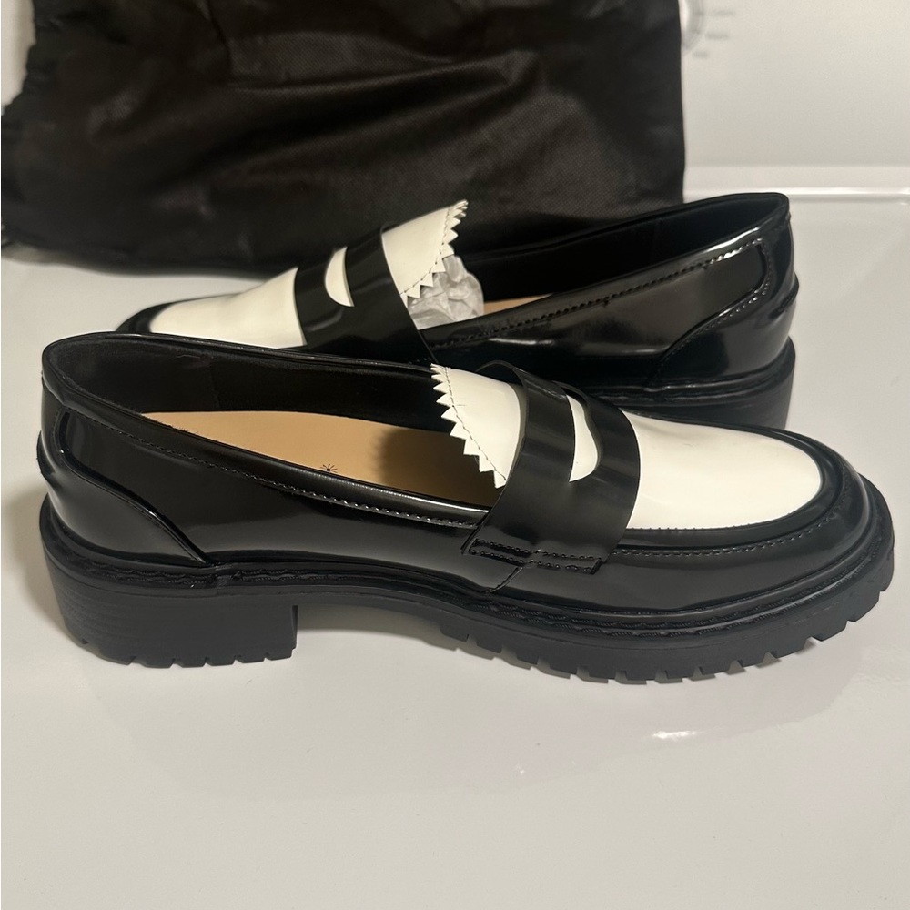 Black and white loafers